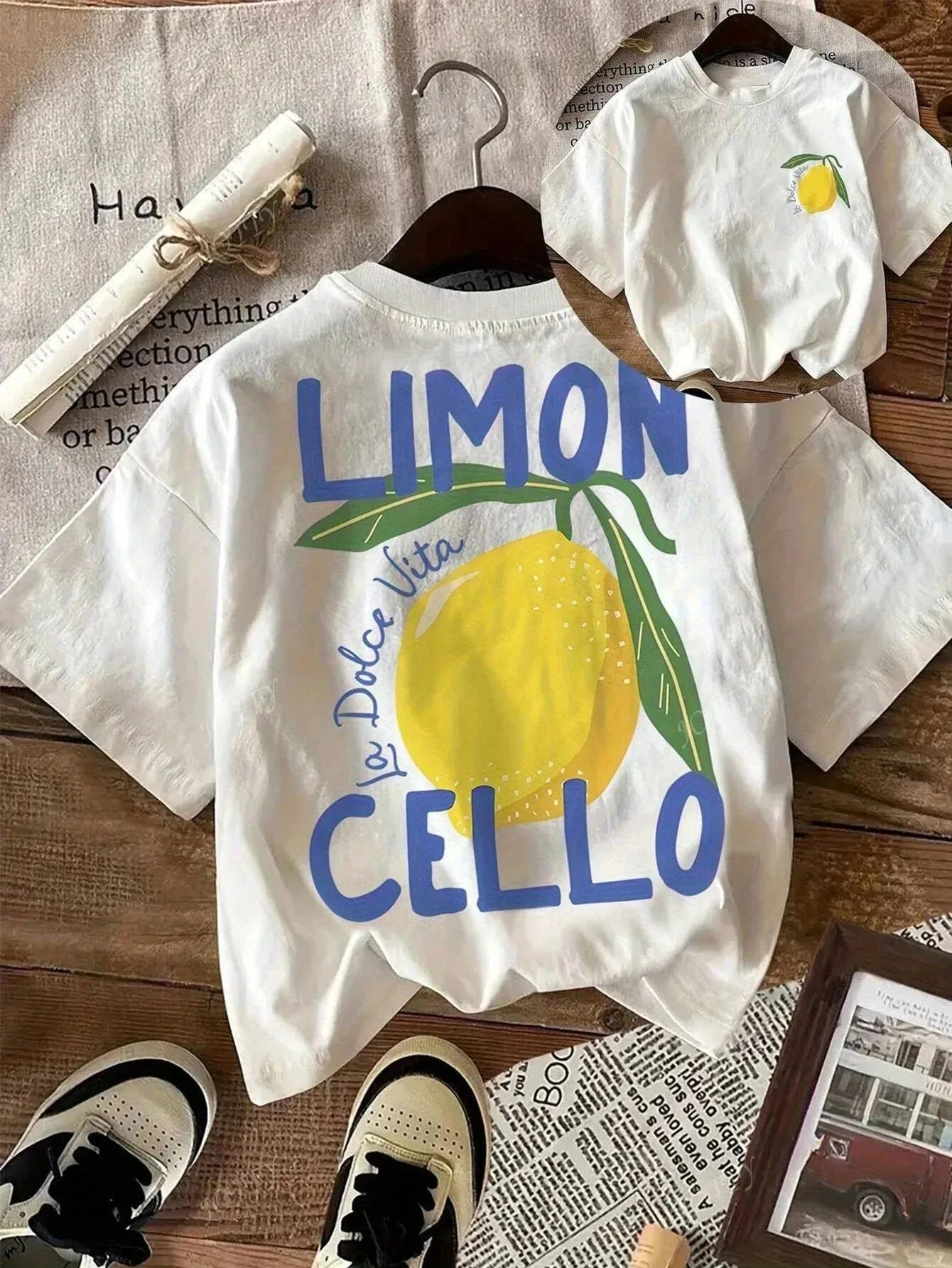 Summer t-shirt for kids, made of cotton, breathable and comfortable, short-sleeved, with a cartoon lemon print.