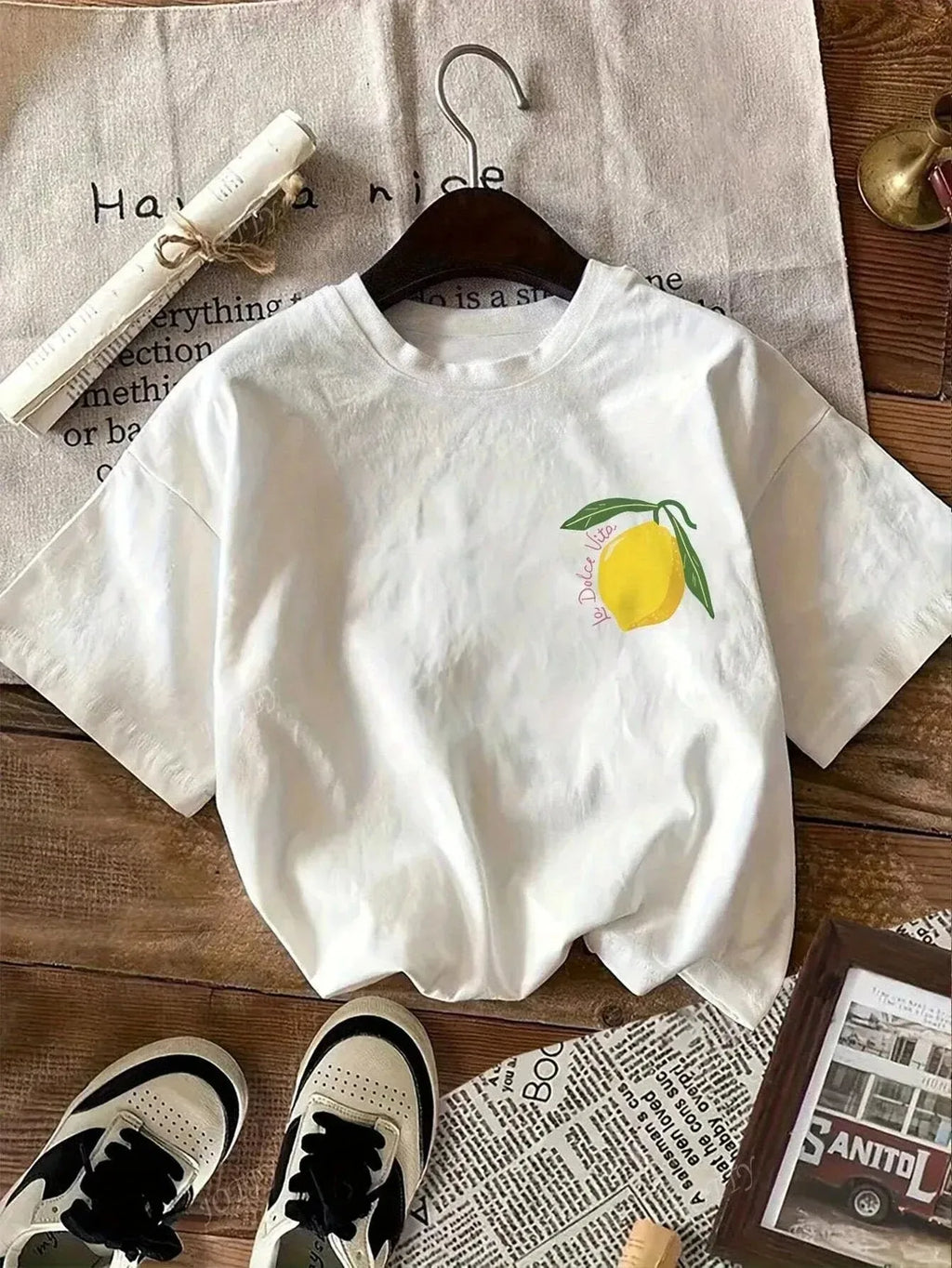 Summer t-shirt for kids, made of cotton, breathable and comfortable, short-sleeved, with a cartoon lemon print.